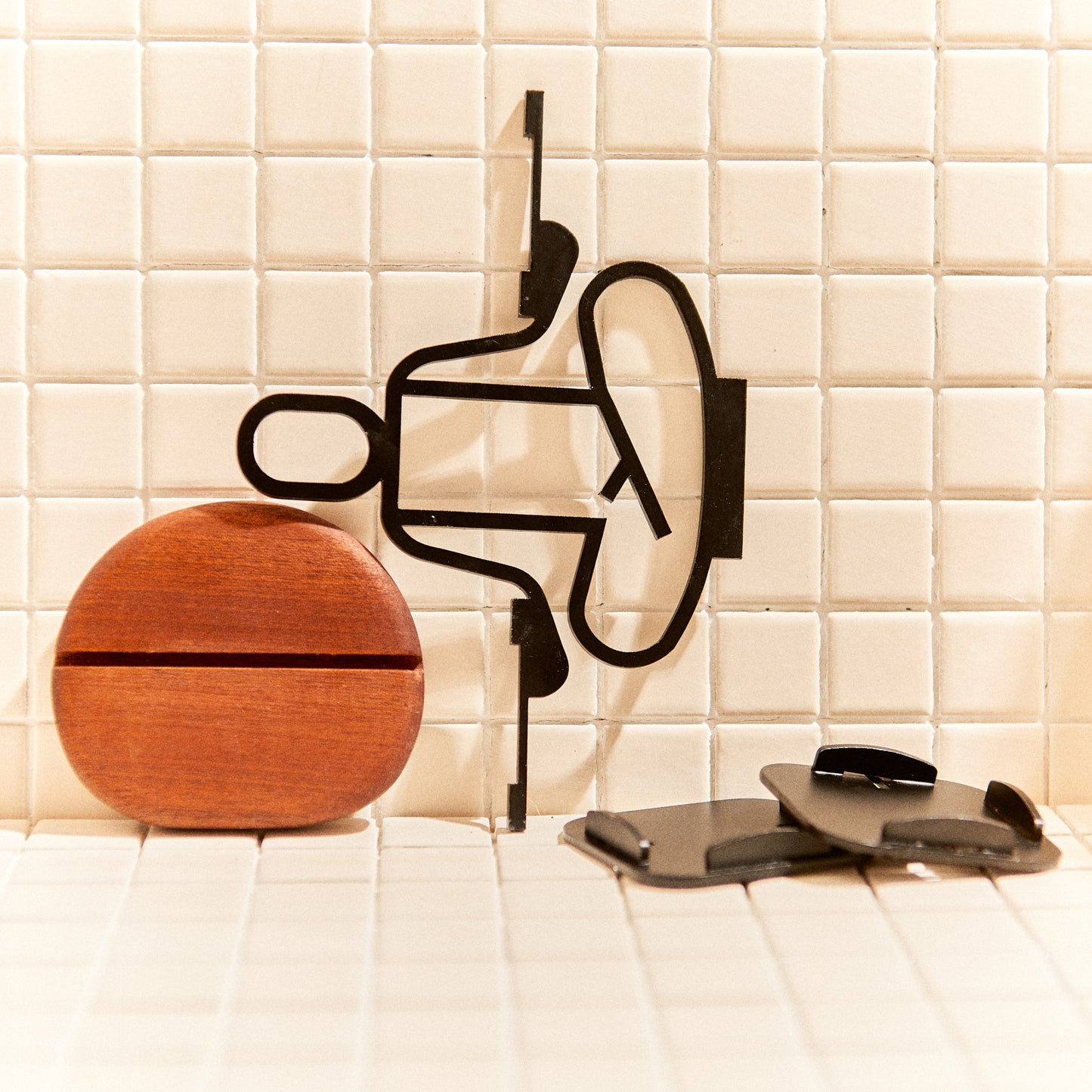 Yoga-inspired candle holder with tealights balanced on arms, handmade metal art for calm homes.