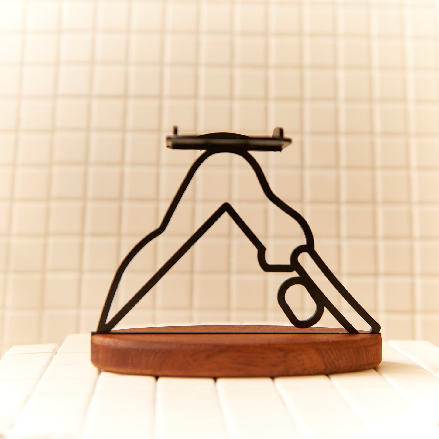 Handcrafted Downward Facing Dog Pose candle holder made of metal and mahogany.