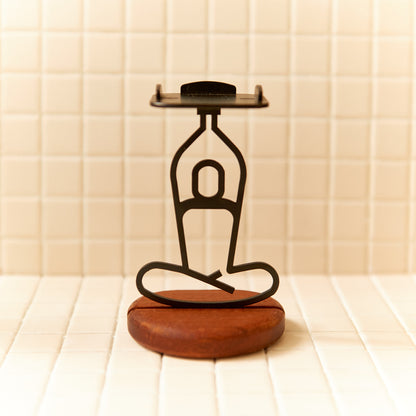 Yoga candle holder inspired by Lotus Pose, minimalist design for mindful spaces.