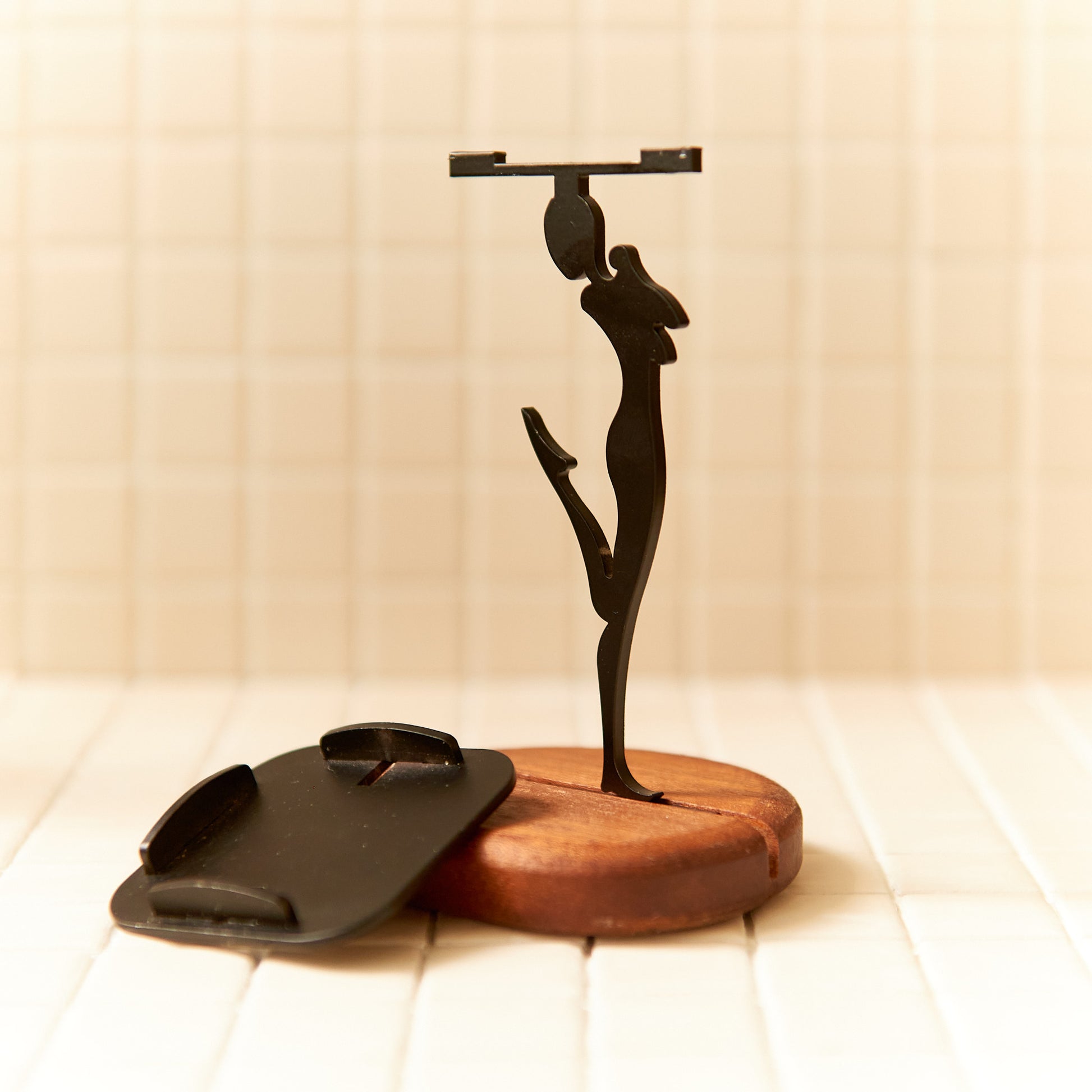 Cosmic-themed handmade alien candle holder with minimalist lines, symbolizing joy and light, perfect for home or meditation decor.