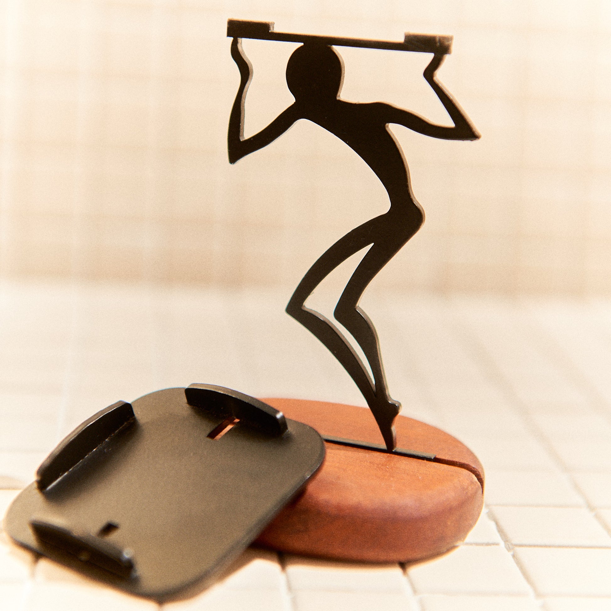 Close-up of handcrafted candle holder representing movement and purpose.