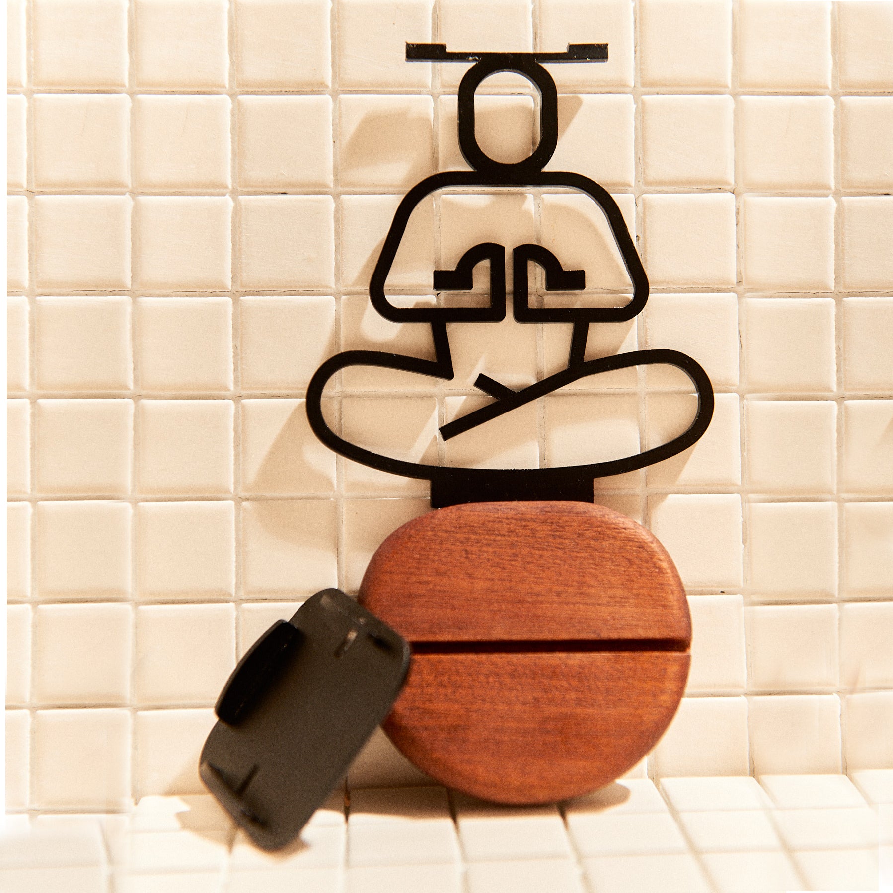 Yoga-inspired candle holder in Ardha Lotus Pose, handcrafted metal art with calming energy.