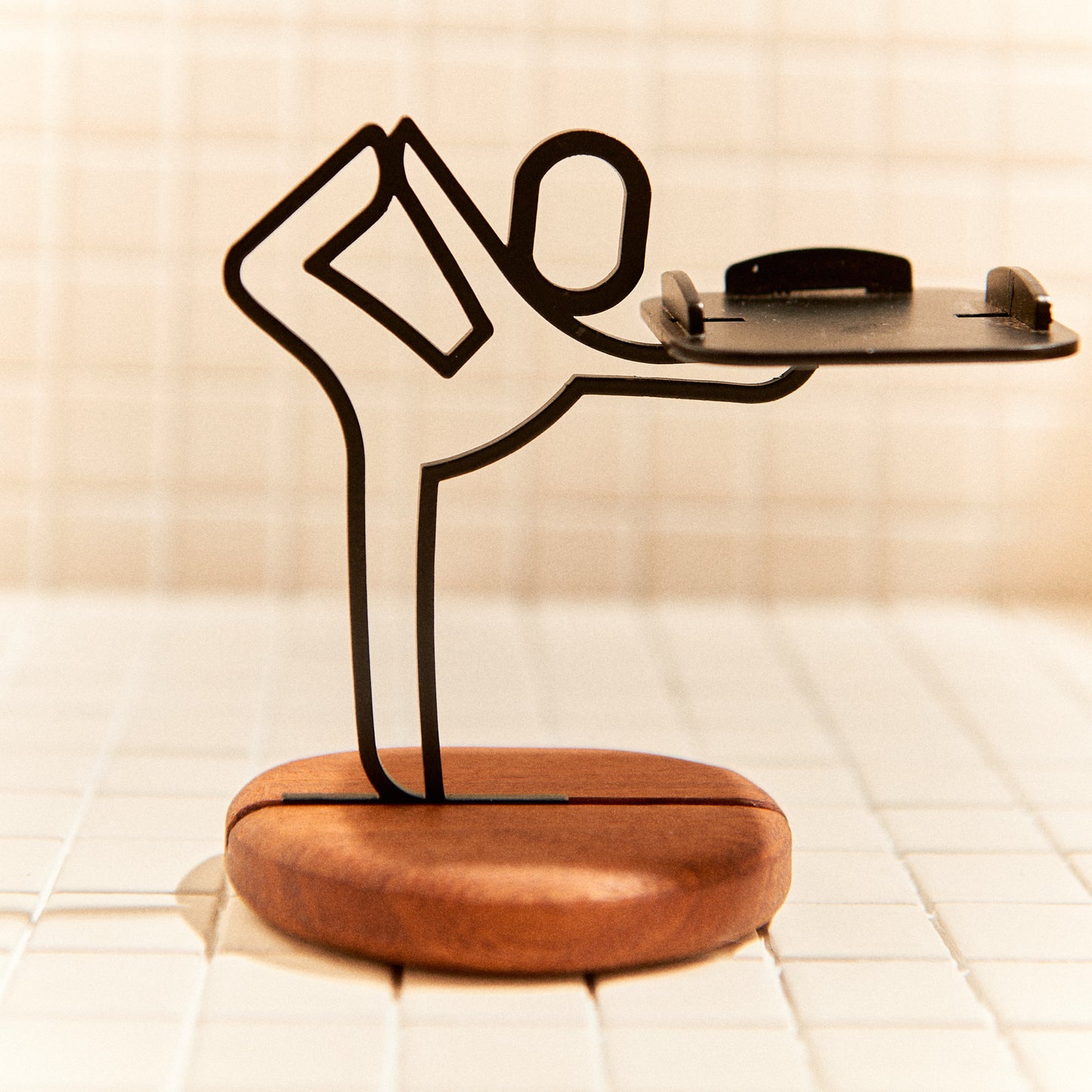 Yoga candle holder in Baby Dancer pose, minimalist handmade metal decor.