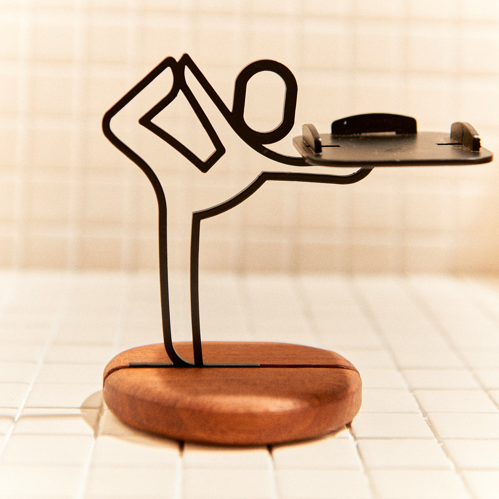 Yoga candle holder in Baby Dancer pose, minimalist handmade metal decor.