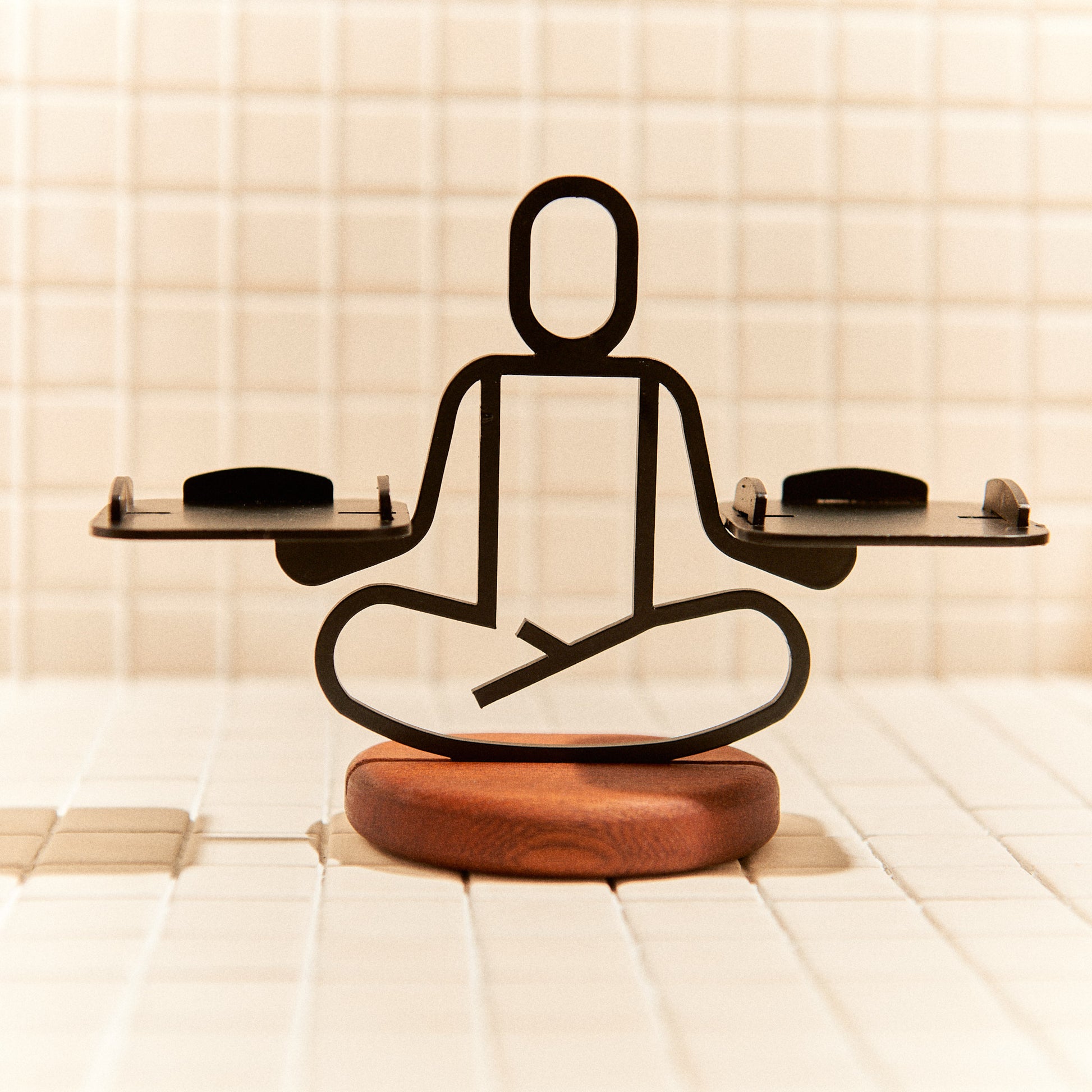 Handcrafted Half Lotus Pose candle holder made of metal and mahogany, symbolizing balance and mindfulness.