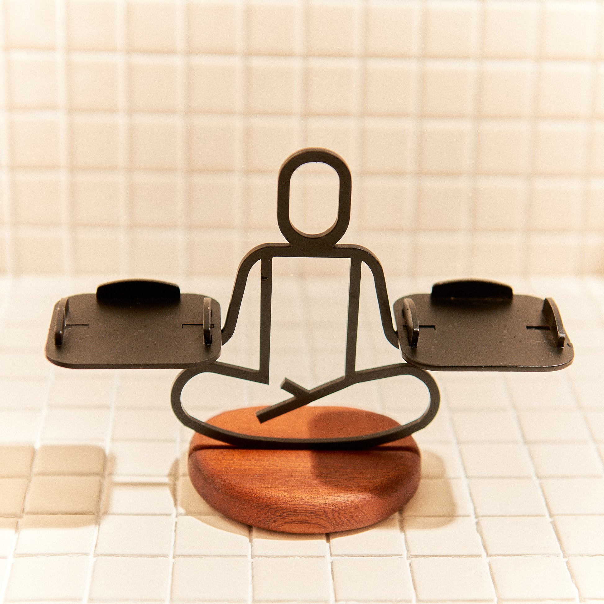 Yoga candle holder in Half Lotus pose with two tealights, minimalist handmade decor.