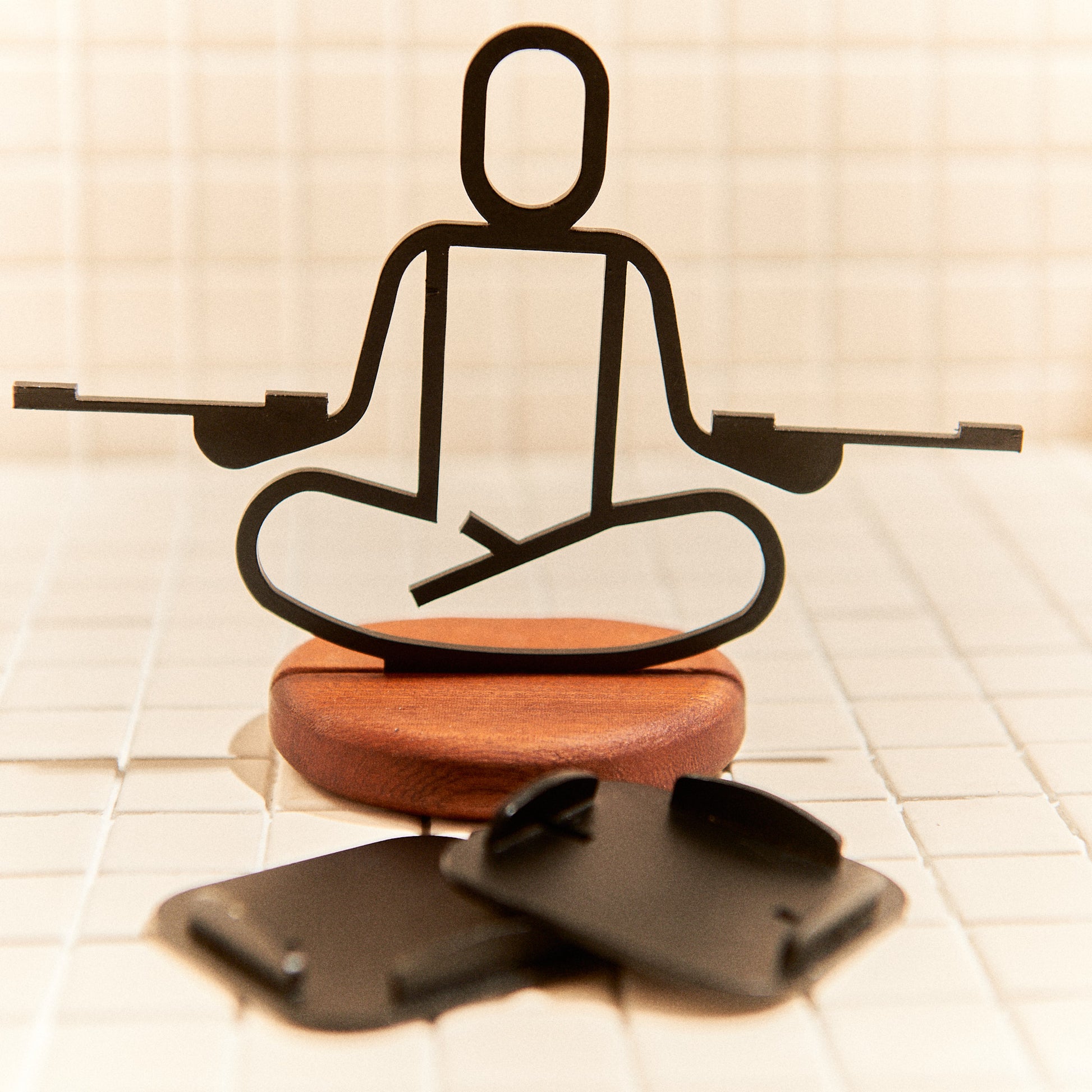 Close-up of handcrafted yoga candle holder, Half Lotus posture, modern boho decor.